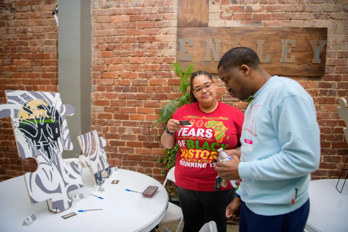 People participating in a Wildcard gallery experience